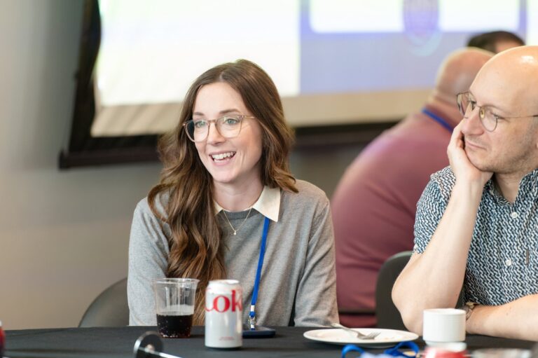 Smiling attendee during a workshop session – Creative Soul Studios