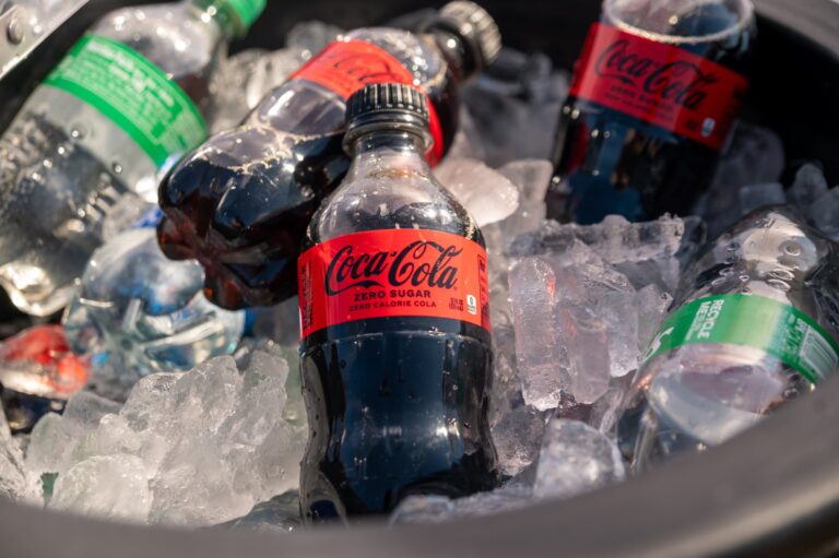 Coca-Cola bottles on ice at a groundbreaking