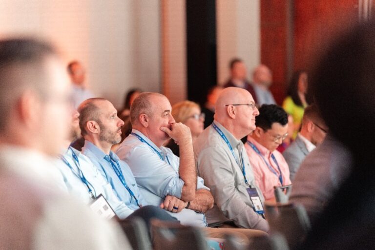 Audience listening at the NeoStella conference