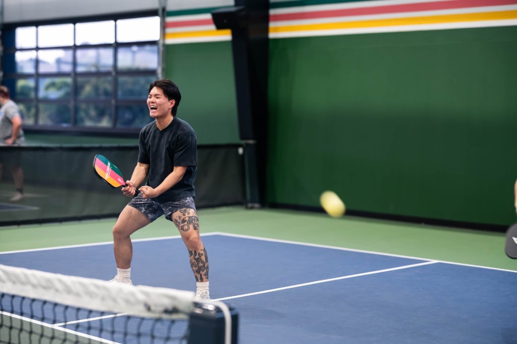Guests playing pickleball at a P&G team event