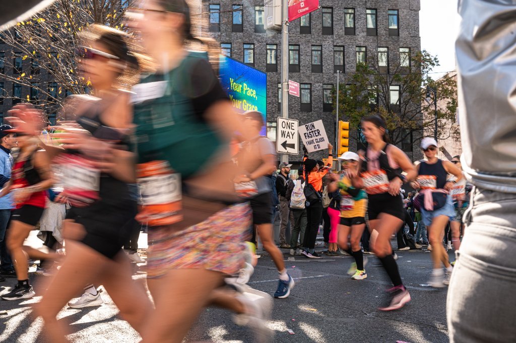 Crowd of runners during a city race