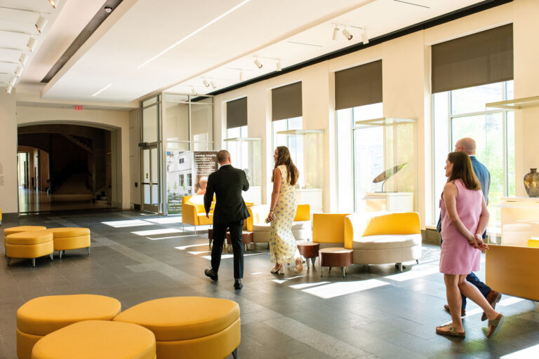 Guests arriving in a gallery hall at the Cincinnati Art Museum