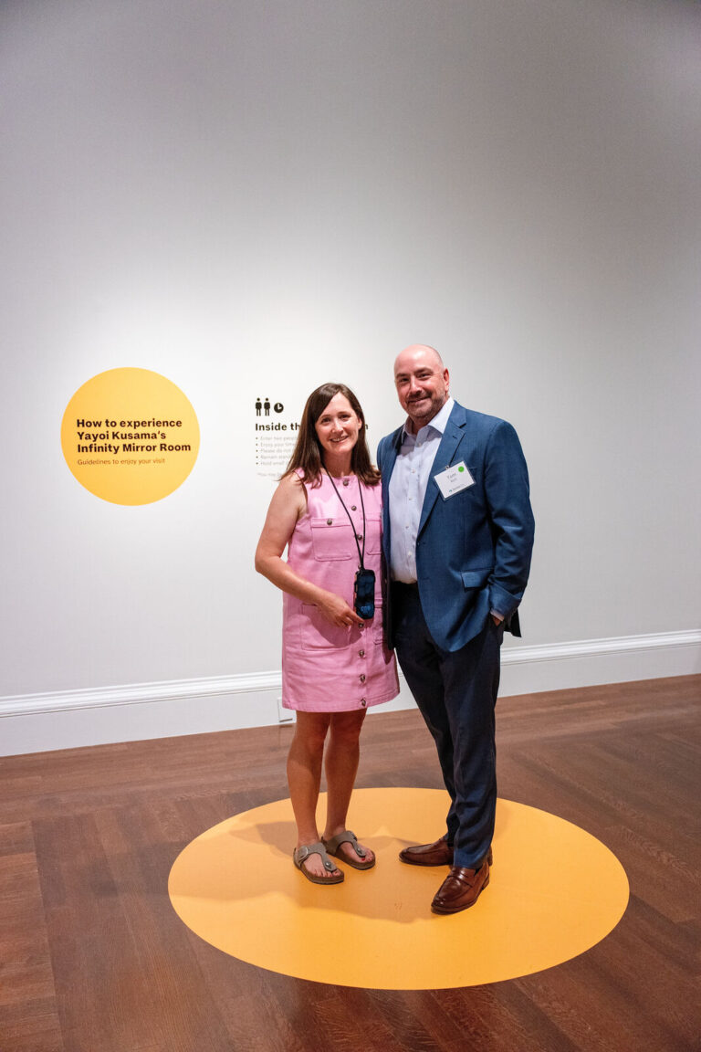 Guests posing at the Kusama exhibition at the Cincinnati Art Museum