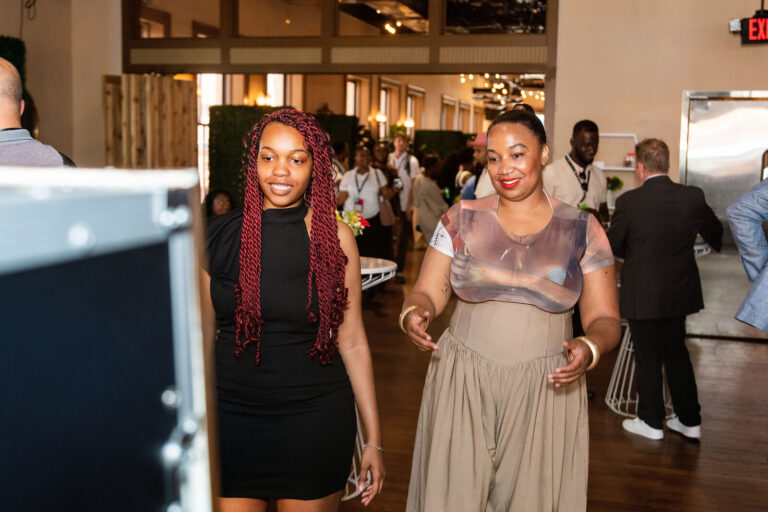 Attendees posing in the event hall at Black Tech Week 2026
