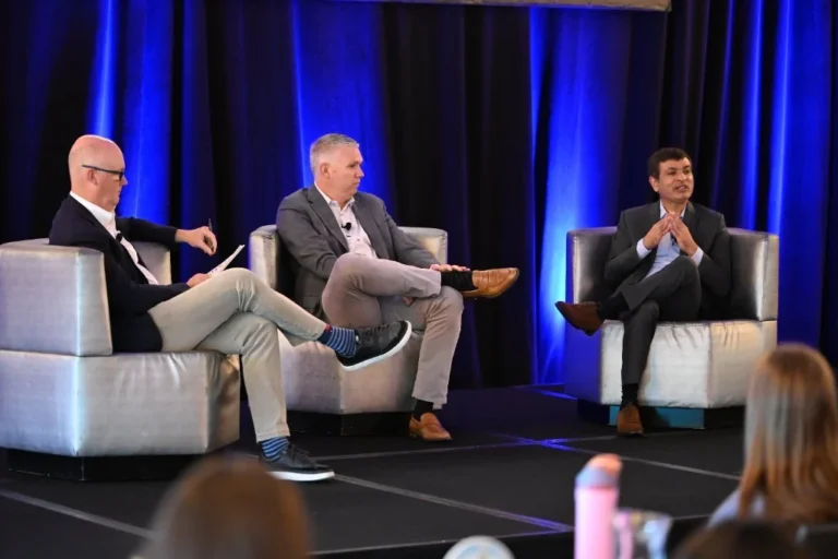 Fireside chat on a conference stage – Creative Soul Studios