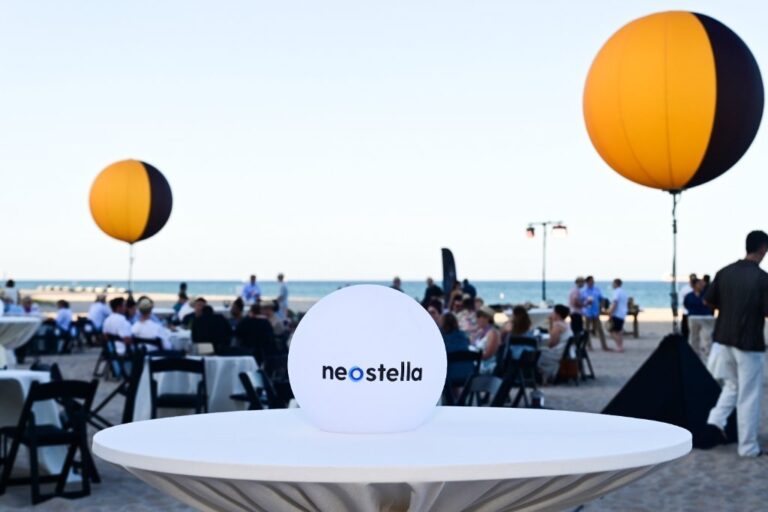 Branded decor at a beachfront corporate reception – Creative Soul Studios