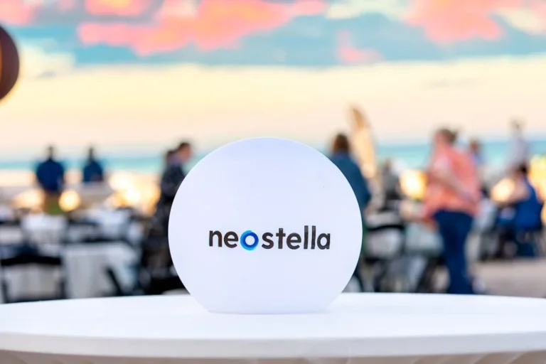 Branded light-up sphere decor at an evening corporate reception – Creative Soul Studios