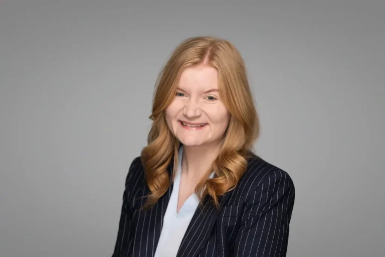 Woman in a pinstripe blazer, corporate headshot – Creative Soul Studios