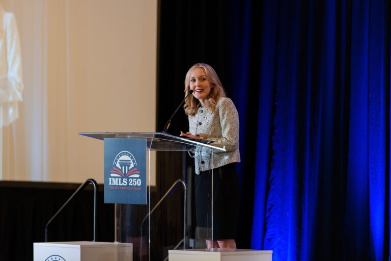 Speaker at the podium during the IMLS Library Convenings general session, St. Louis