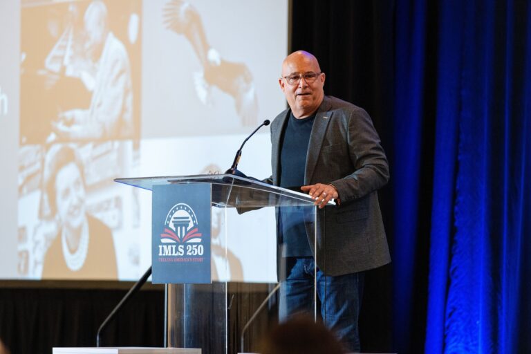 Speaker at the IMLS 250 podium at the St. Louis Marriott Grand