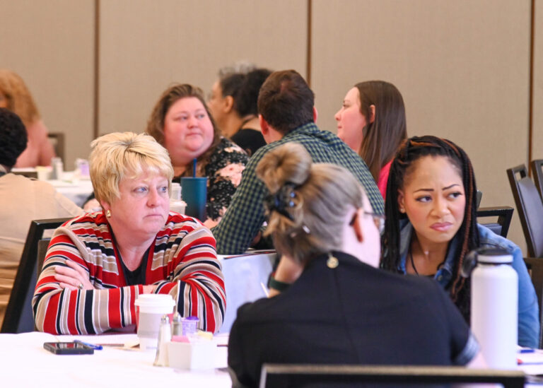 Attendees engaged in a session at the Dayton Convention Center