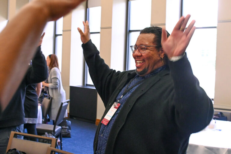 Attendee celebrating during a LeaderShift session