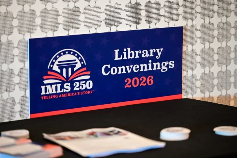 Conference signage on a registration table – Creative Soul Studios