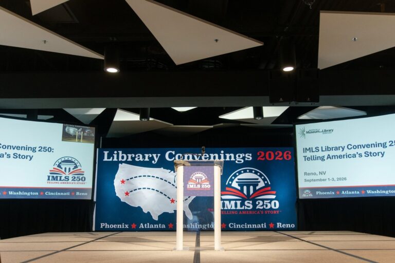 Conference stage set with podium before the opening session – Creative Soul Studios