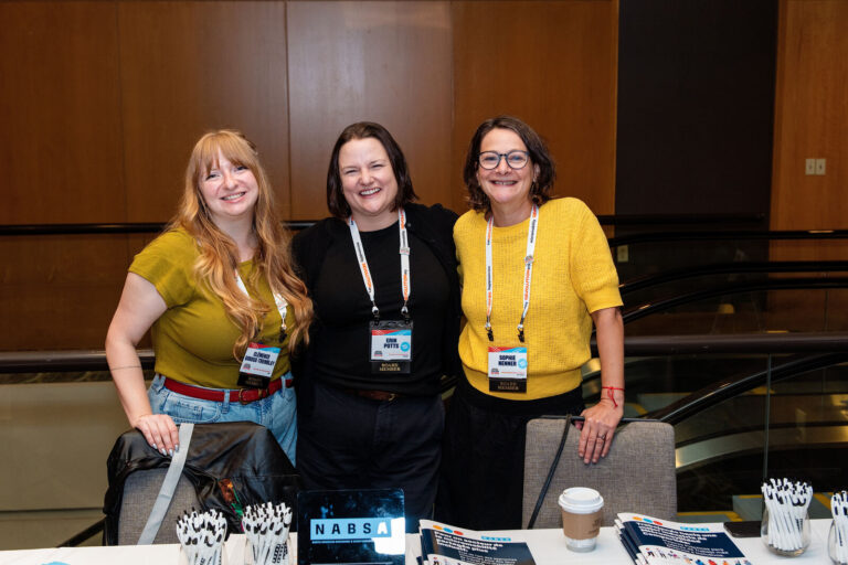 Exhibitors posing together at the NABSA conference