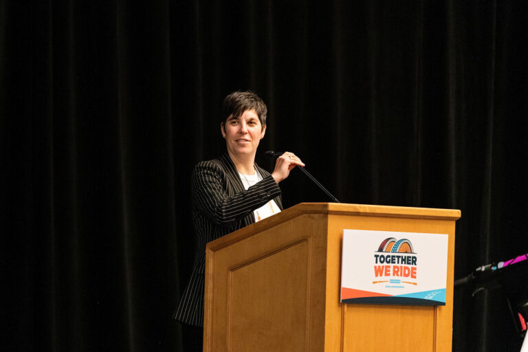 Speaker at the Together We Ride podium at NABSA 2026