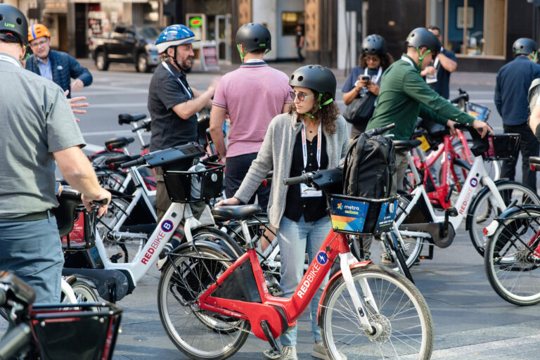 Attendees on Red Bike e-bikes for the NABSA group ride in Cincinnati