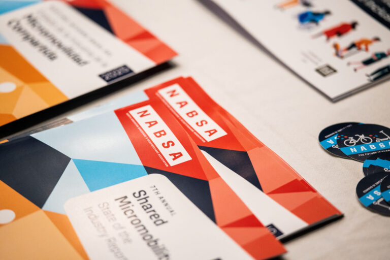 NABSA printed materials and stickers on an exhibitor table