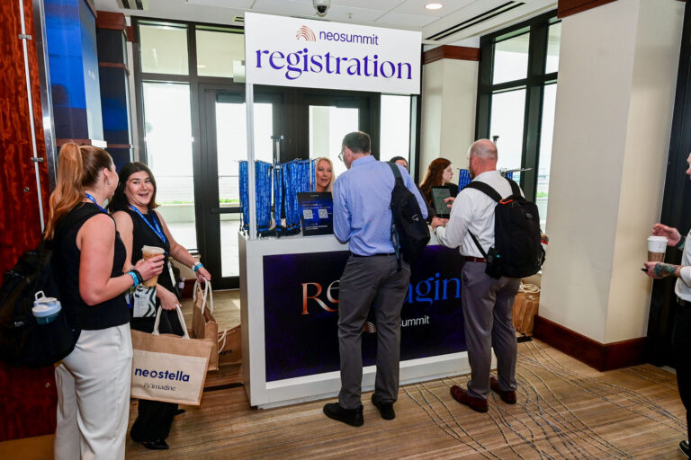 NeoSummit registration desk at Fort Lauderdale Marriott Harbor Beach