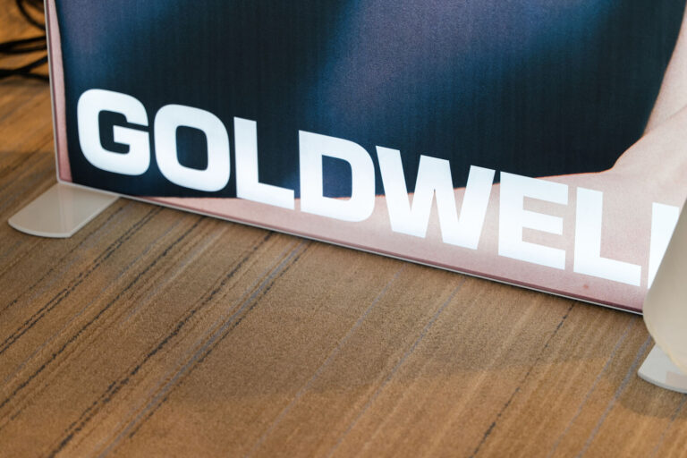 Goldwell signage at a salon industry event in Fort Lauderdale
