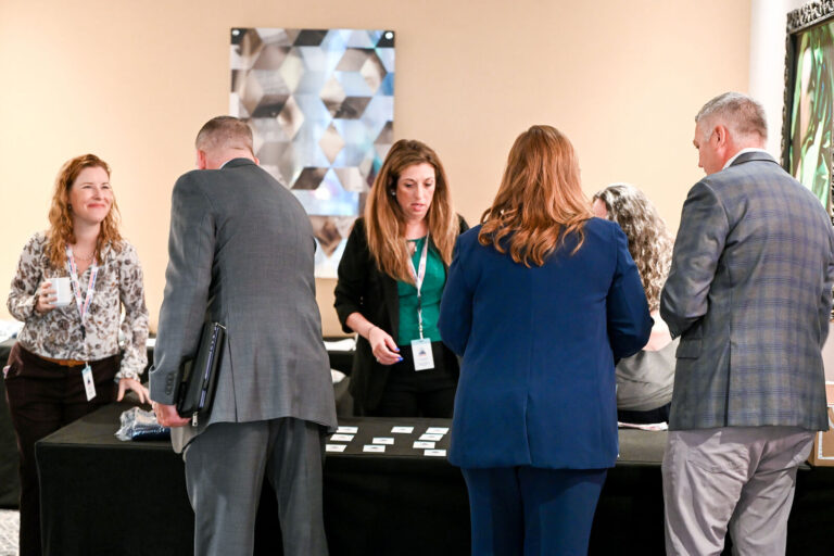 Attendees checking in at the Perfetti Van Melle event
