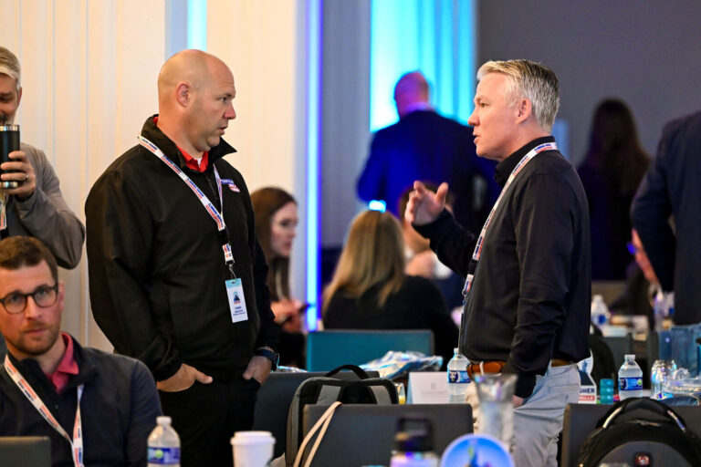 Attendees networking between sessions at Renaissance Cincinnati