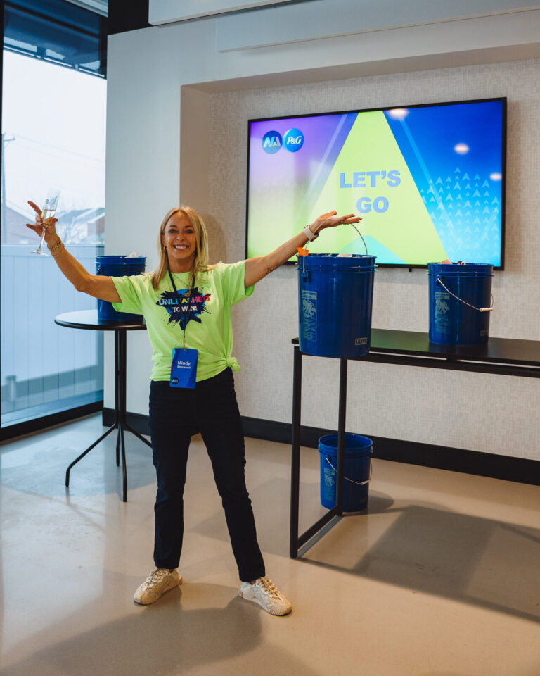 Host welcoming guests to a P&G team event at TQL Stadium