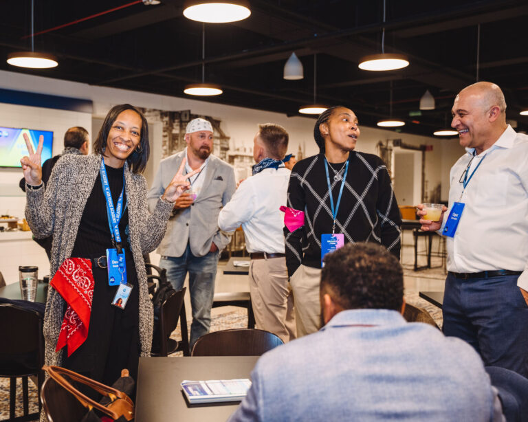 Networking in the TQL Stadium club at a P&G event