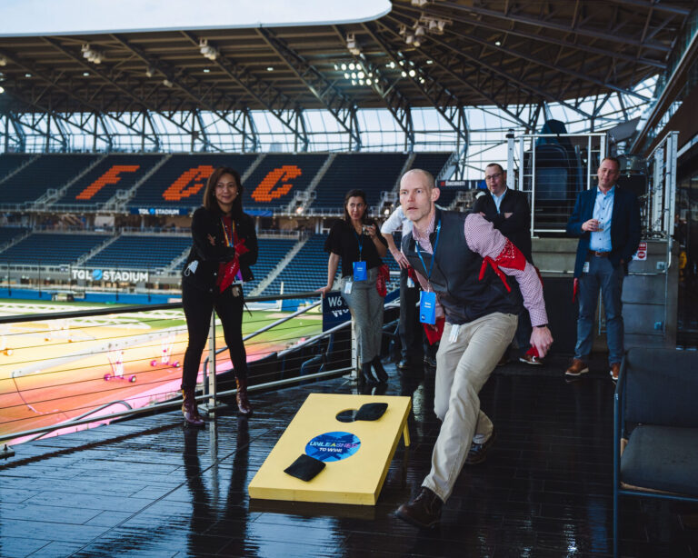 Cornhole on the TQL Stadium terrace during a P&G corporate event