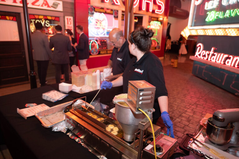 Caterer at a food station at the P&G Baby Care celebration, American Sign Museum Cincinnati