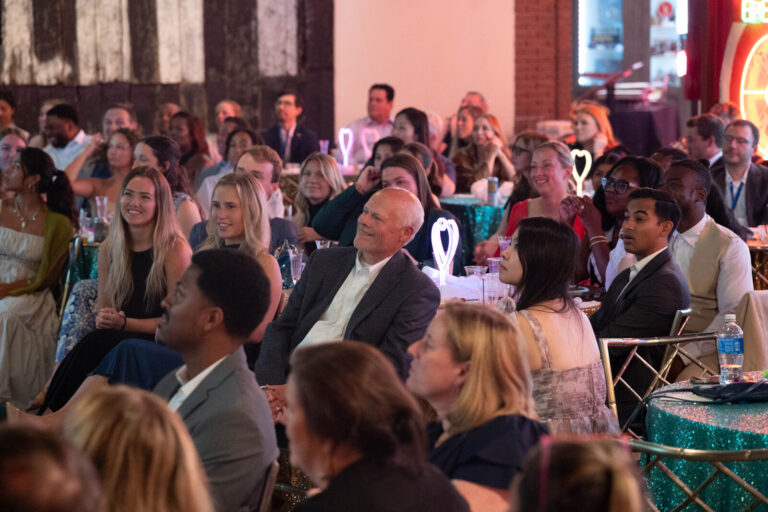 Guests seated during the program at the P&G Baby Care celebration, American Sign Museum Cincinnati