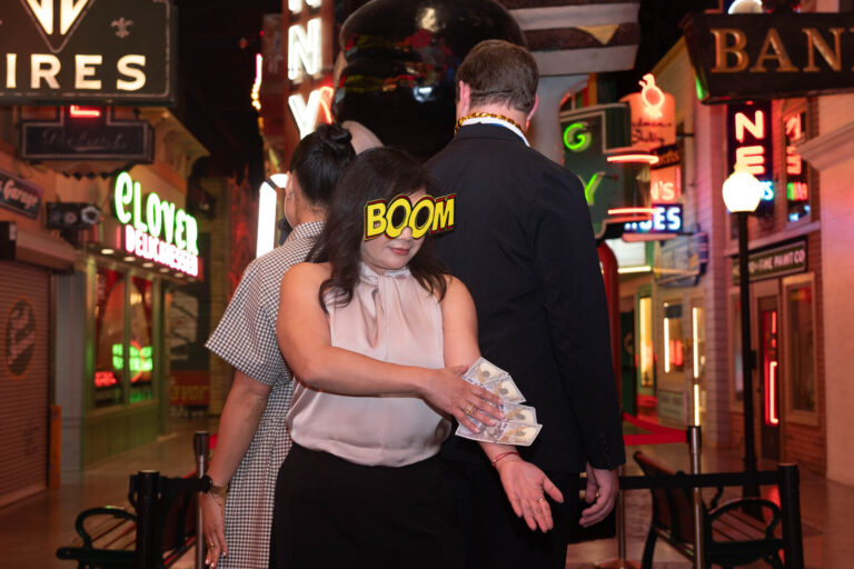 Guest dancing in the neon street at the P&G Baby Care celebration, American Sign Museum Cincinnati