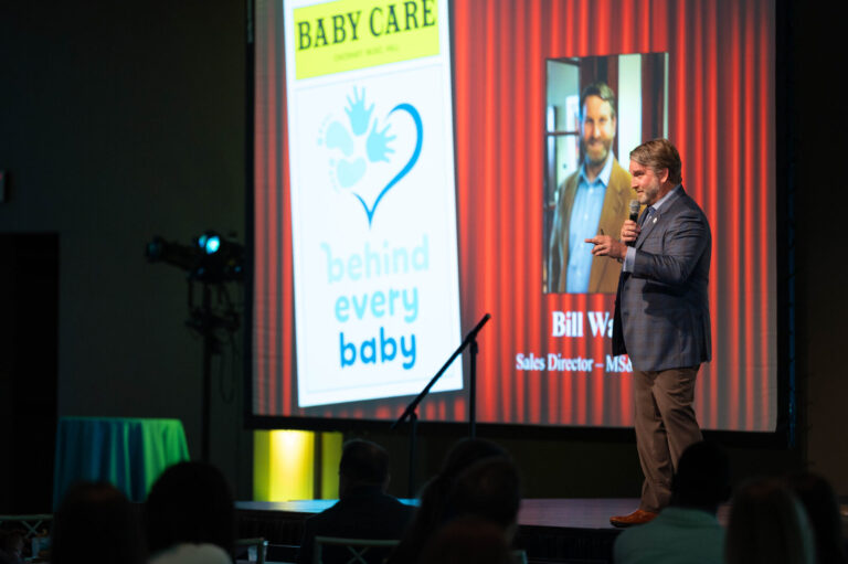 Baby Care speaker on stage at the P&G Baby Care event, Music Hall Cincinnati