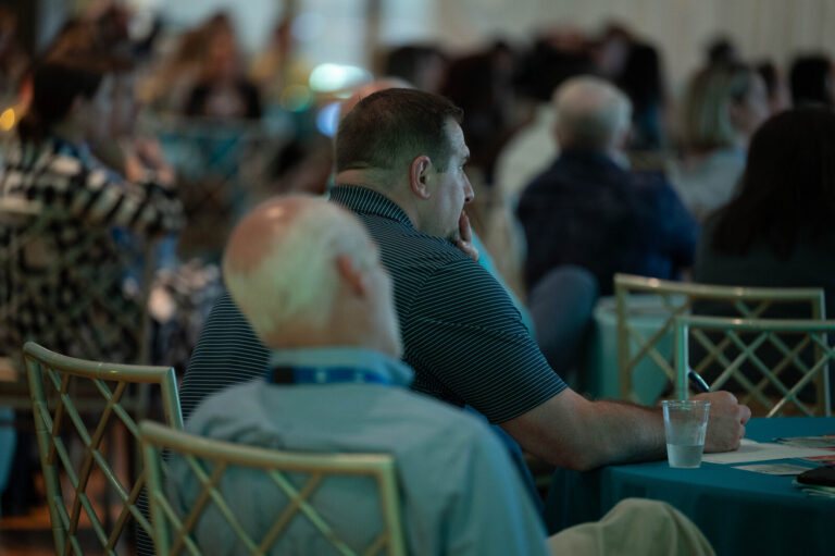 Attendees seated in the ballroom at the P&G Baby Care event, Music Hall Cincinnati