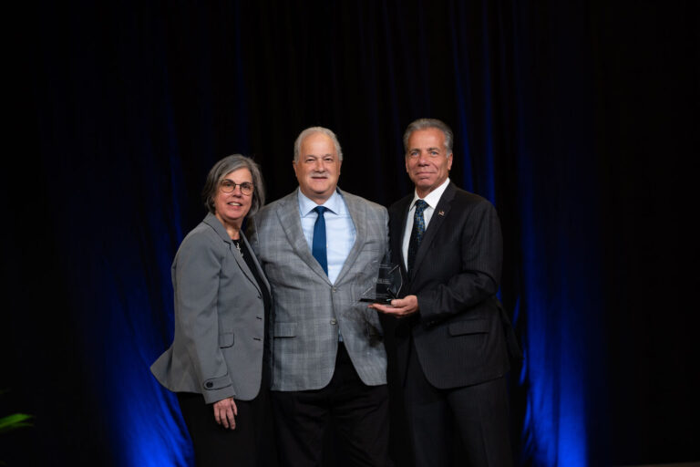 Award presentation on stage at the Phoenix World Burn Congress