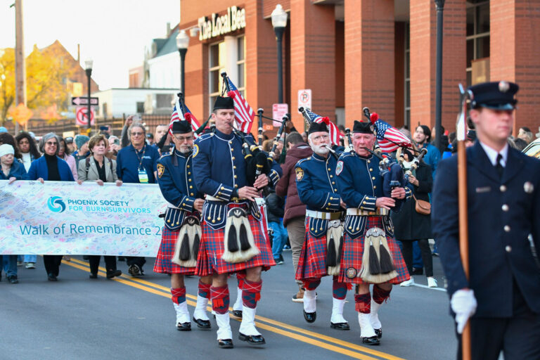 Bagpipers marching in the Phoenix Society Walk of Remembrance