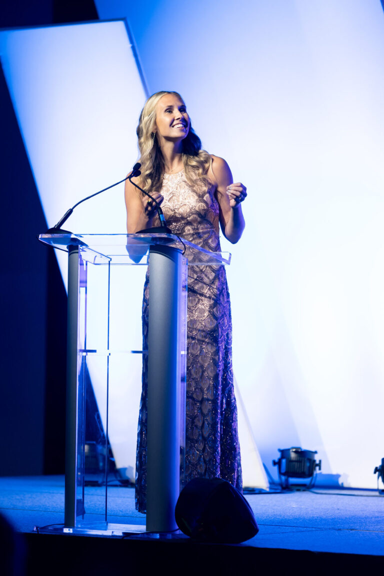Speaker at the podium at the Ronald McDonald House Charities gala, Northern Kentucky Convention Center