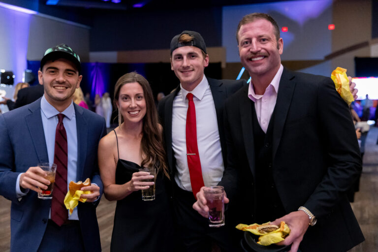 Guests posing with McDonald’s fries at the Ronald McDonald House Charities gala, Northern Kentucky Convention Center