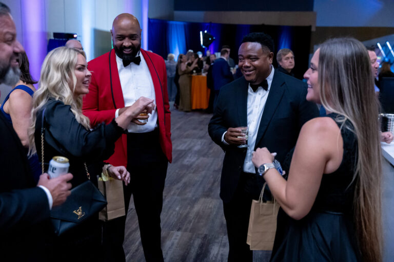 Guests chatting at the Ronald McDonald House Charities gala, Northern Kentucky Convention Center