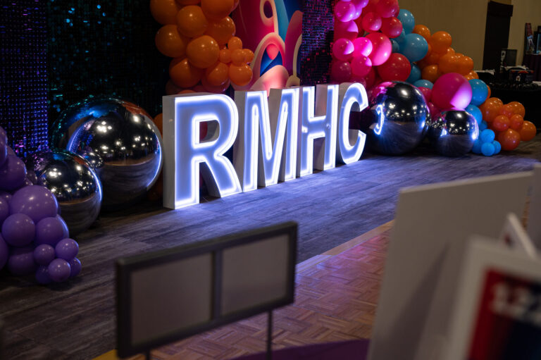 Lighted RMHC letters and balloons at the Ronald McDonald House Charities gala, Northern Kentucky Convention Center