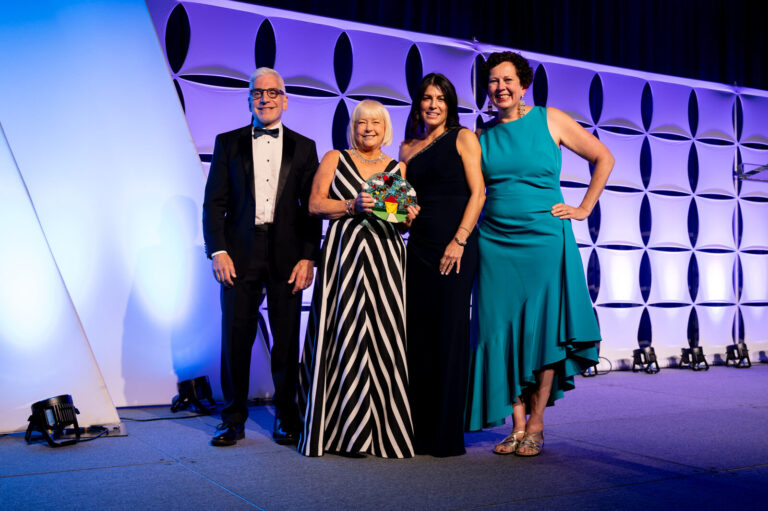 Group photo on stage at the Ronald McDonald House Charities gala, Northern Kentucky Convention Center