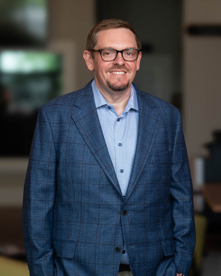 Environmental headshot of a Wendal team member at their office in Covington, KY
