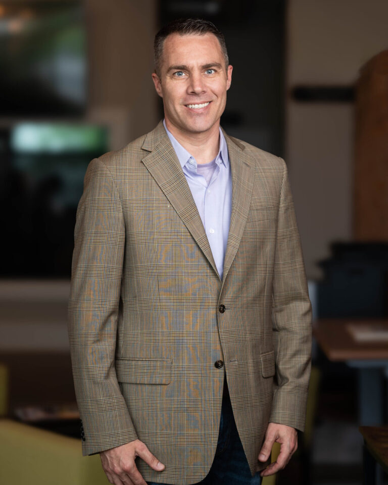 Environmental headshot of a Wendal team member at their office in Covington, KY