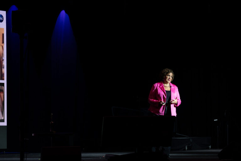 Speaker on the large stage at the Zeno Group P&G GABLE event, Hard Rock Casino Cincinnati